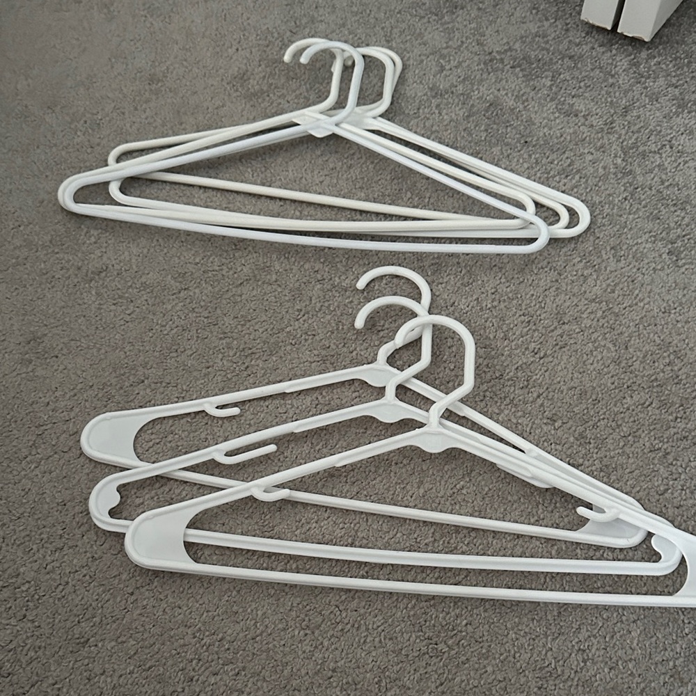 Set of White Plastic Hangers